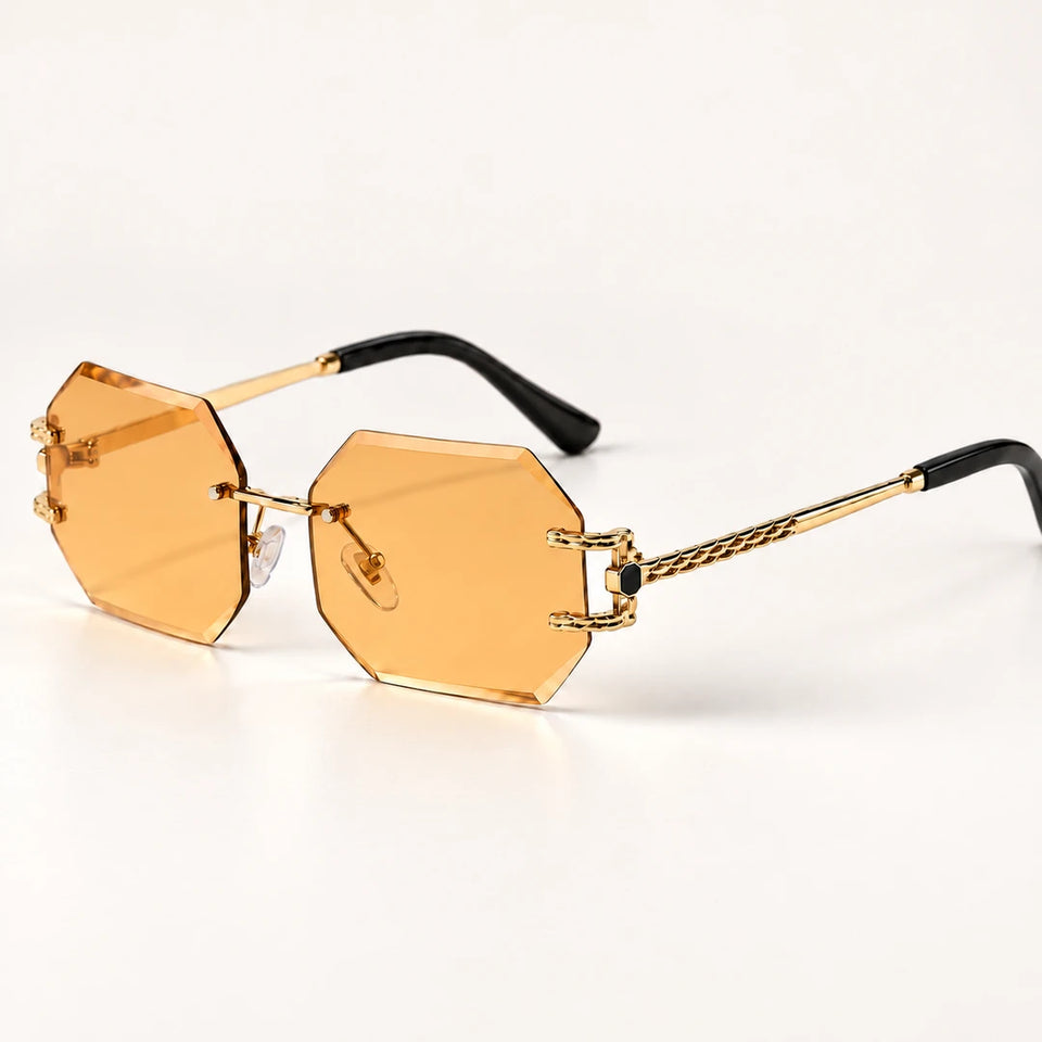 Óculos de sol feminino hexagonal sem aro Mionelle Facet Champagne Gold em vista de três quartos