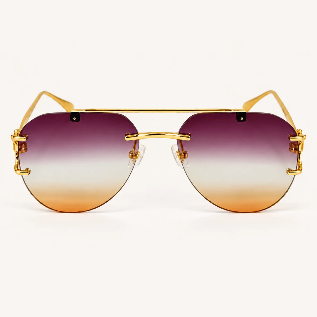 Vista frontal do Mionelle Halo Amethyst, com estrutura dourada e lentes em degradê roxo e âmbar