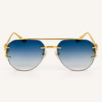 Vista frontal do Mionelle Halo Sky Blue, com estrutura dourada e lentes azuis em degradê