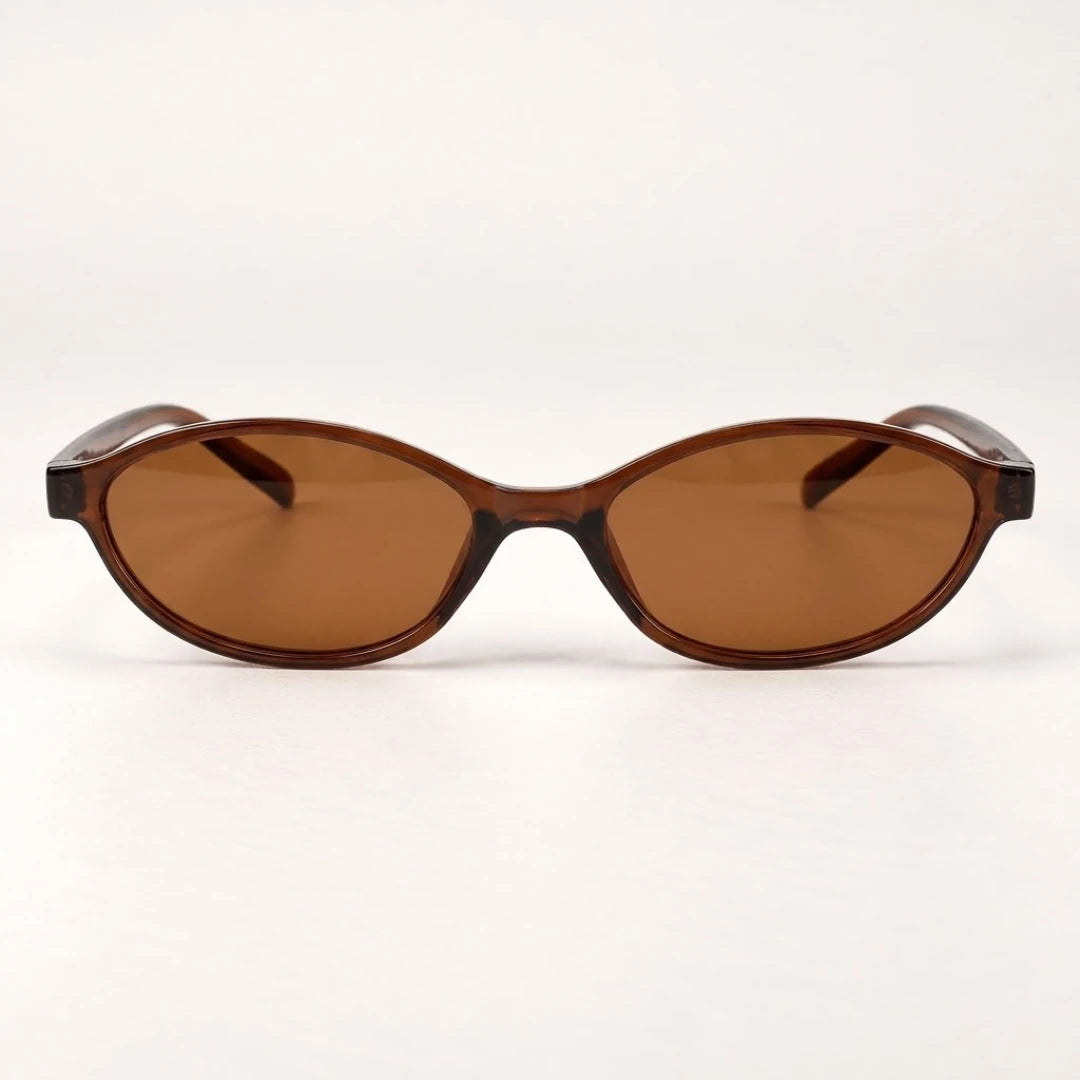 Vista frontal do Mionelle Narrow Vibe Rich Brown, com armação marrom âmbar translúcida e lentes marrons