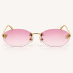 Vista frontal do Mionelle Luna Pink Y2K, com estrutura dourada e lentes rosas em degradê