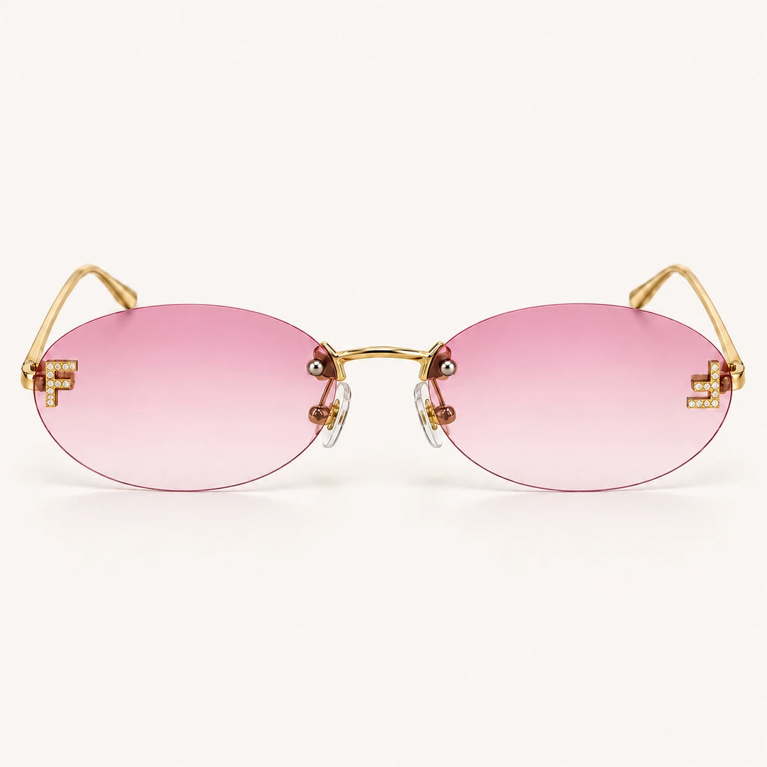 Vista frontal do Mionelle Luna Pink Y2K, com estrutura dourada e lentes rosas em degradê