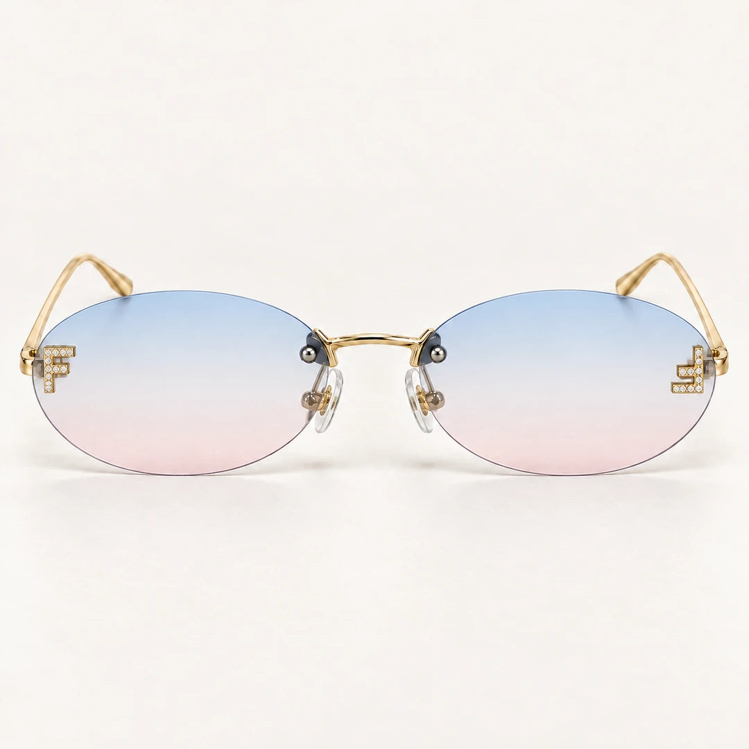 Vista frontal do Mionelle Luna Sky Blue, com estrutura dourada e lentes em degradê azul e rosa