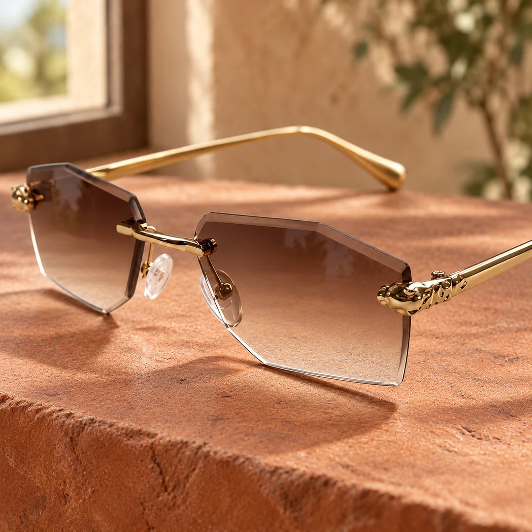 Detalhe das lentes marrons em degradê e do ornamento dourado lateral do Mionelle Aura Vintage Brown