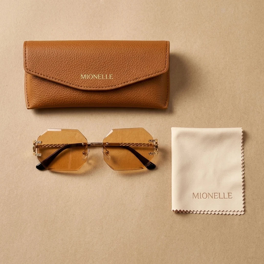 Kit Mionelle Facet Champagne Gold com óculos de hastes dobradas, estojo caramelo e pano de microfibra claro