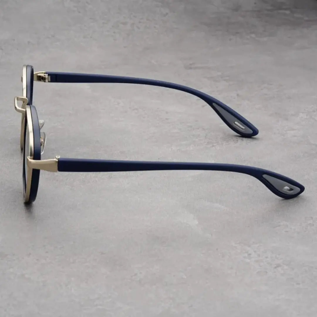 Óculos de Sol Redondo Vintage Masculino ou Feminino Mionele Orion Azul de lado sobre um fundo cinza