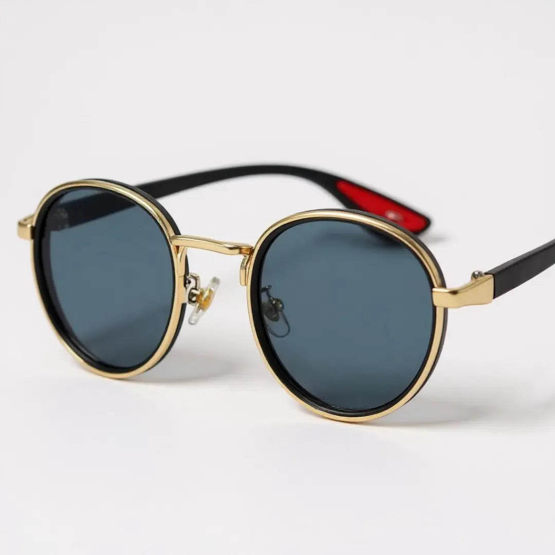 Óculos de Sol Redondo Vintage Masculino ou Feminino Mionelle Orion Golden Preto sobre o fundo neutro