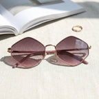 óculos de sol hexagonal feminino rosa retrô detalhe